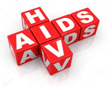 Read building blocks with letters that spell out HIV and AIDS